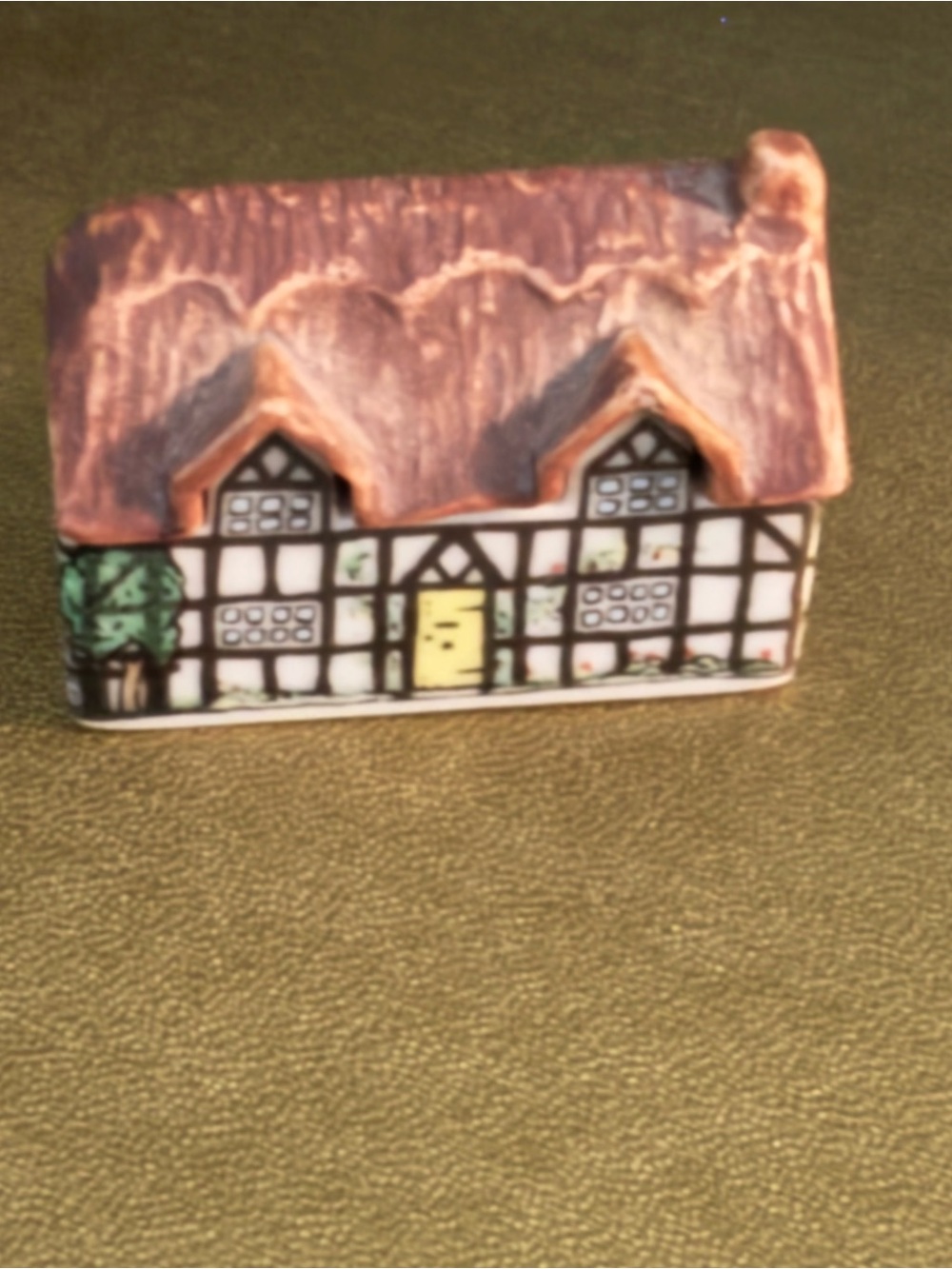 Pump Cottage" (No. 1), a vintage miniature porcelain building from Wade England.